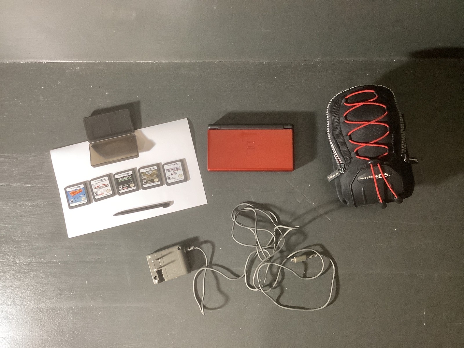 Nintendo DS Lite Crimson Red. Charger/Stylus/Carrying Case/5 Games. Works